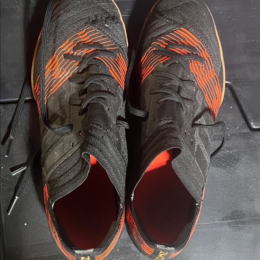 adidas Black and Orange Messi soccer shoes